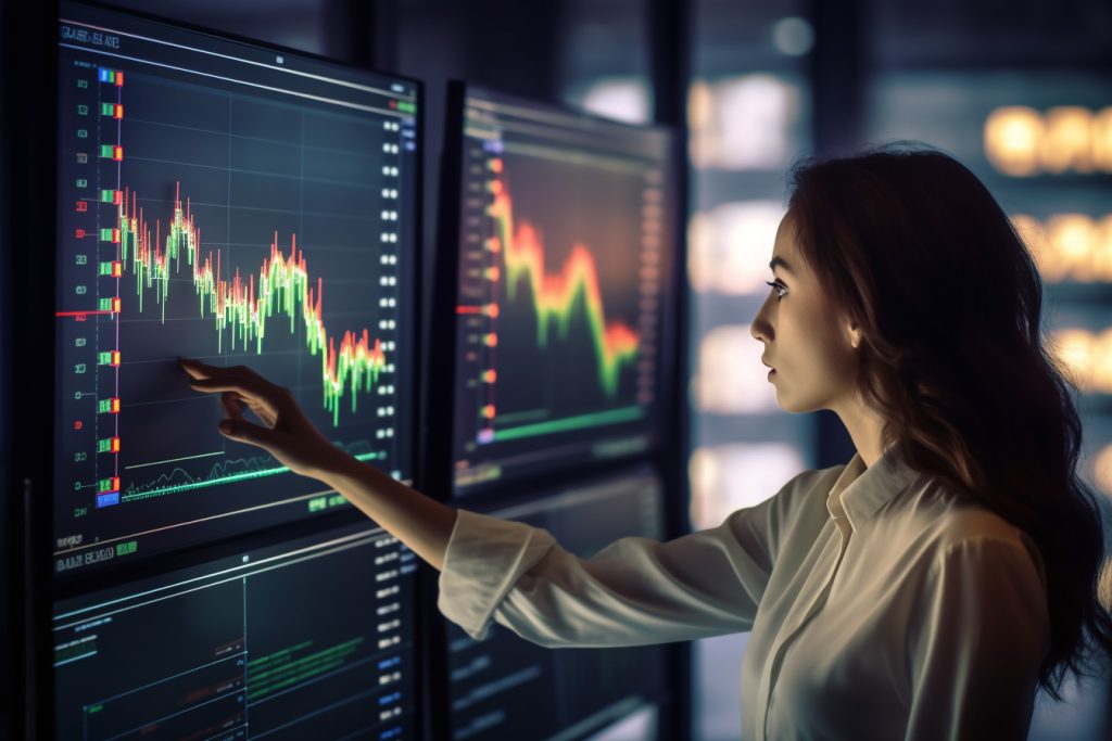 the girl is standing in front of the monitor Copy Trading